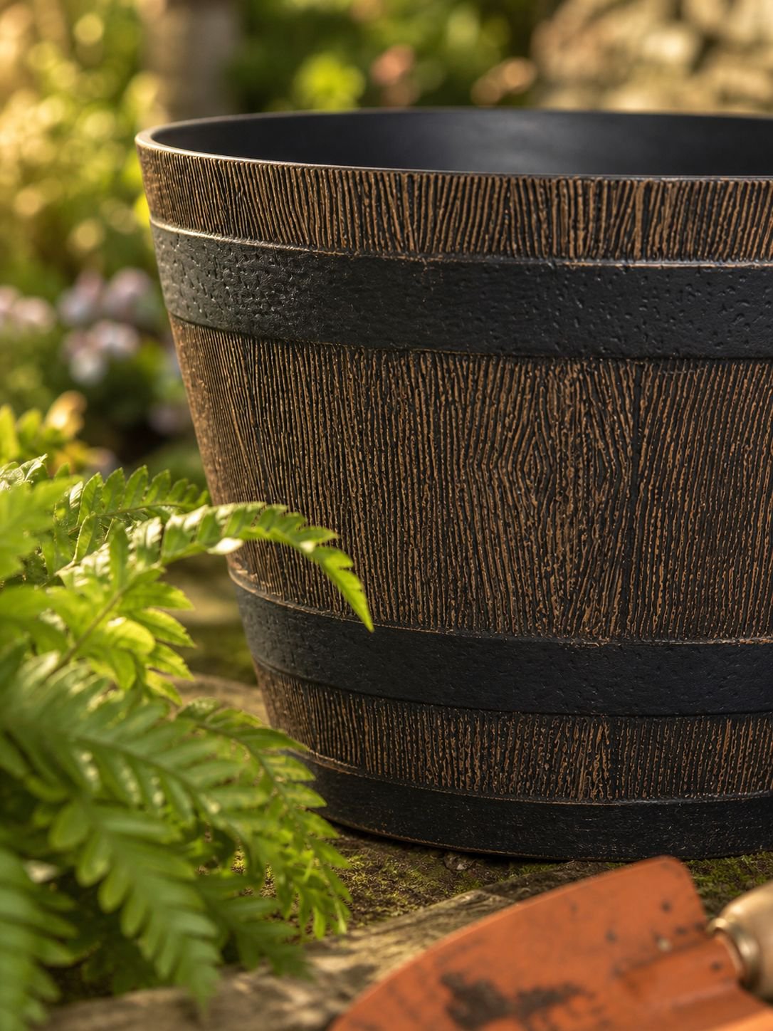Sturdy outdoor plant container with wood design