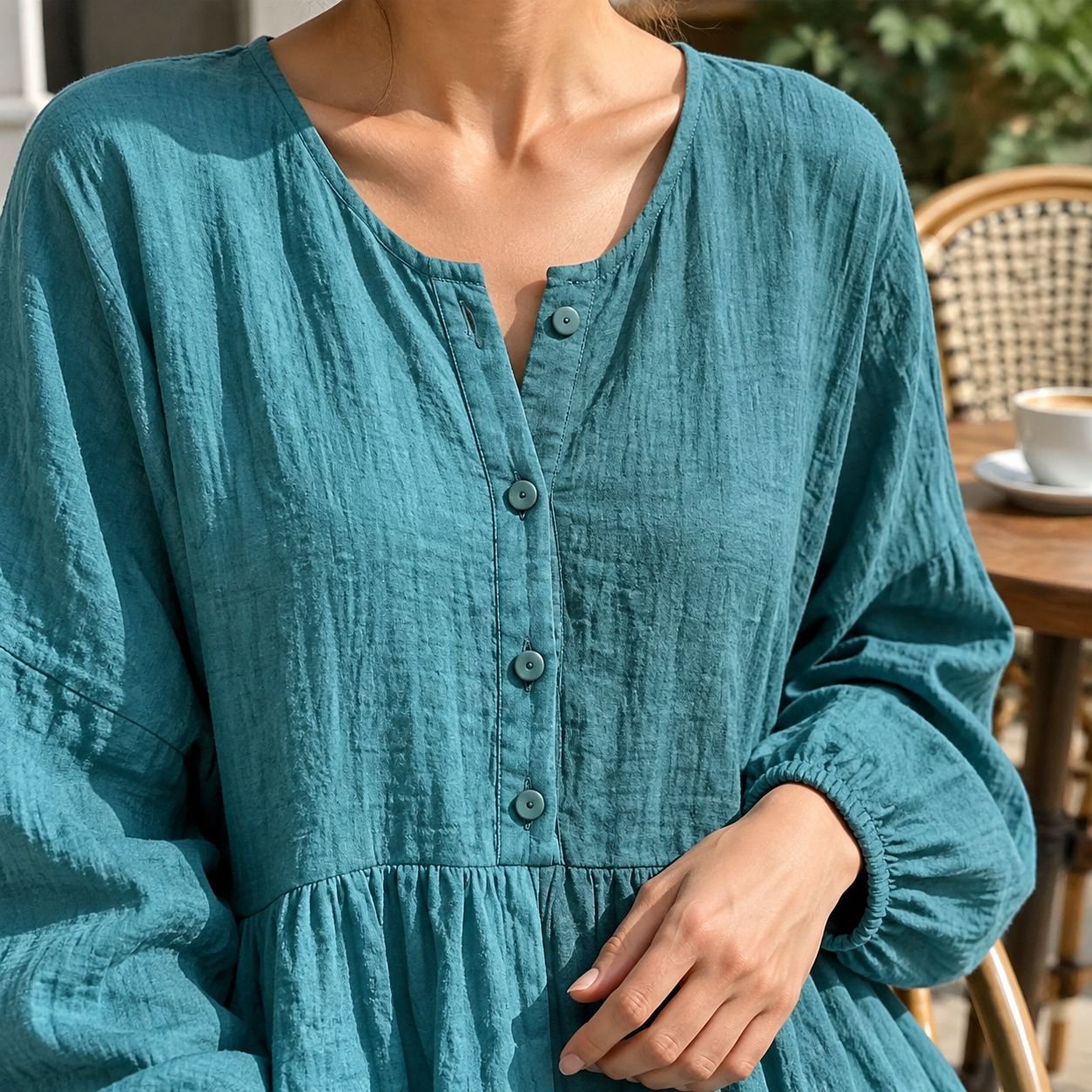 Model wearing modern pleated dress