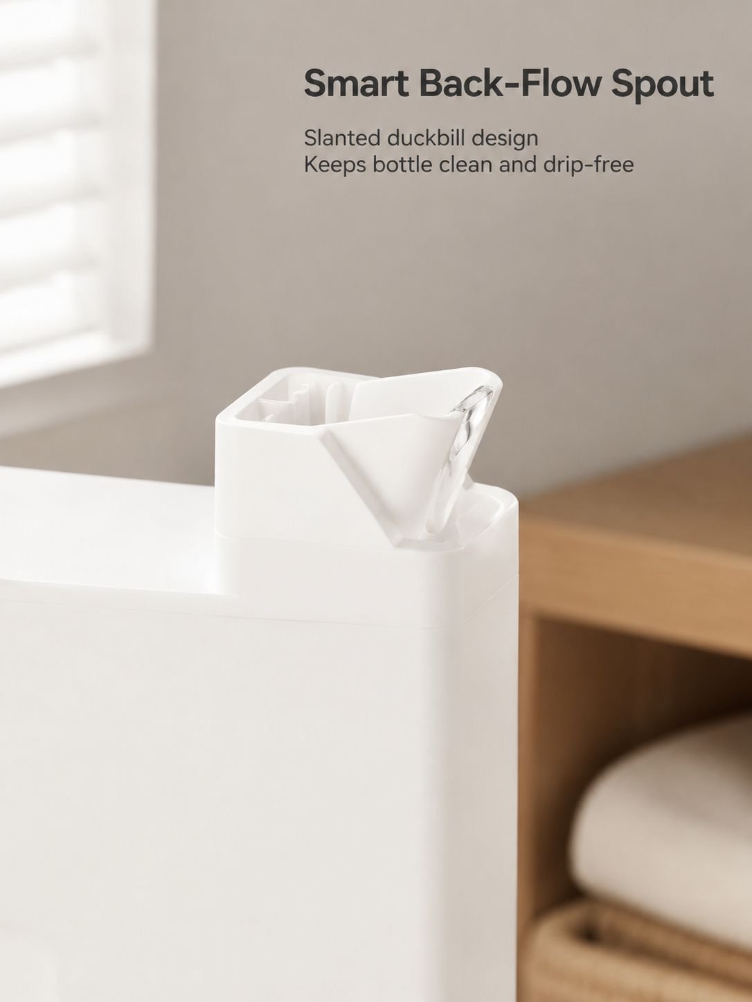 Laundry detergent storage container with easy-pour spout