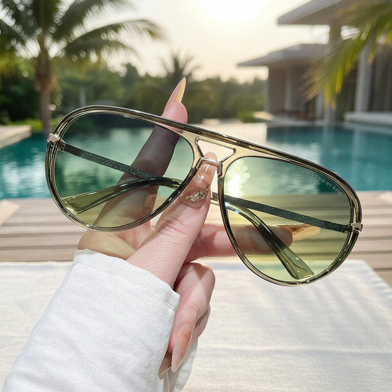 Model wearing trendy oversized aviator sunglasses outdoors