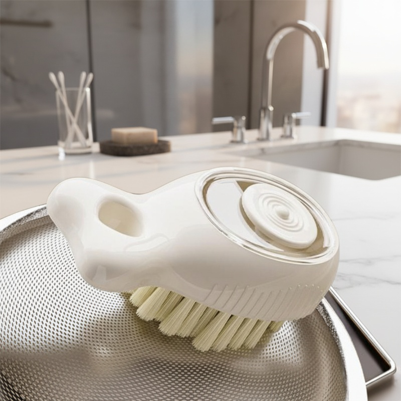Cleaning brush removing tough stains from sink
