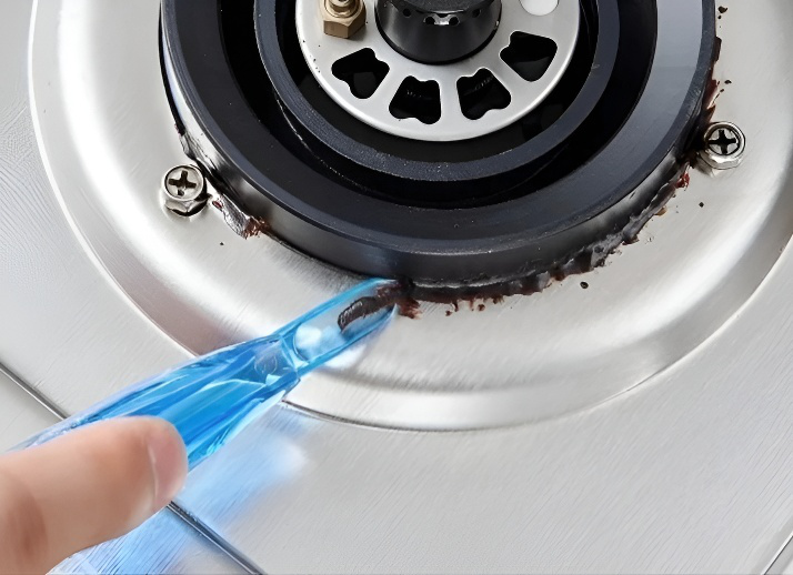 Detalle del mango ergonómico del raspador de cocina