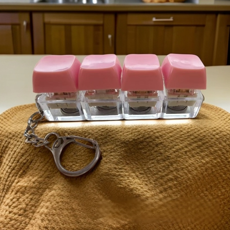 Porte-clés déstressant à boutons lumineux arc-en-ciel