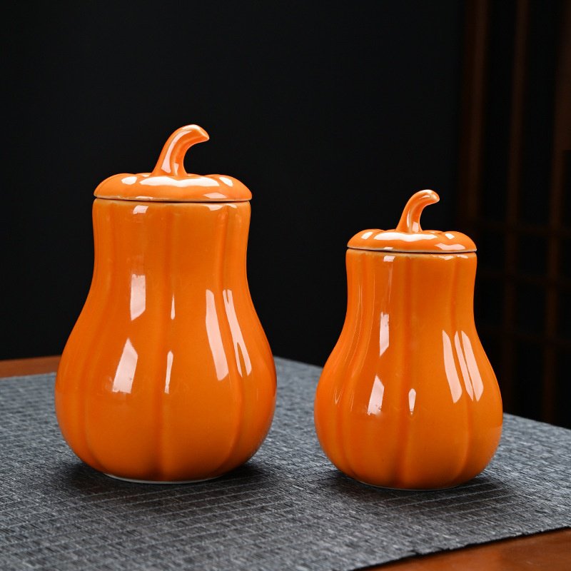Close-up of the ceramic finish and pumpkin details on the storage jar