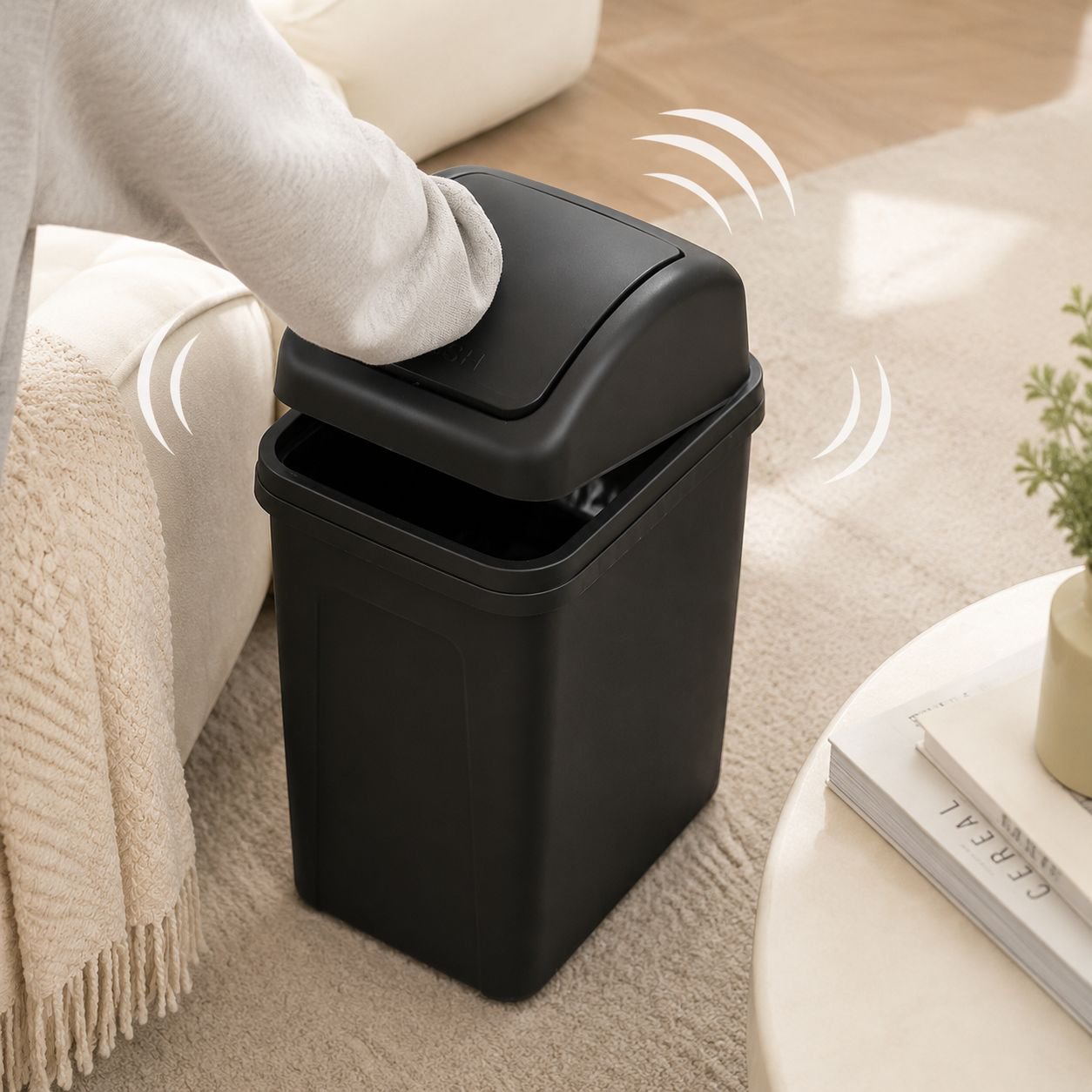 Living room trash bin featuring a convenient handle