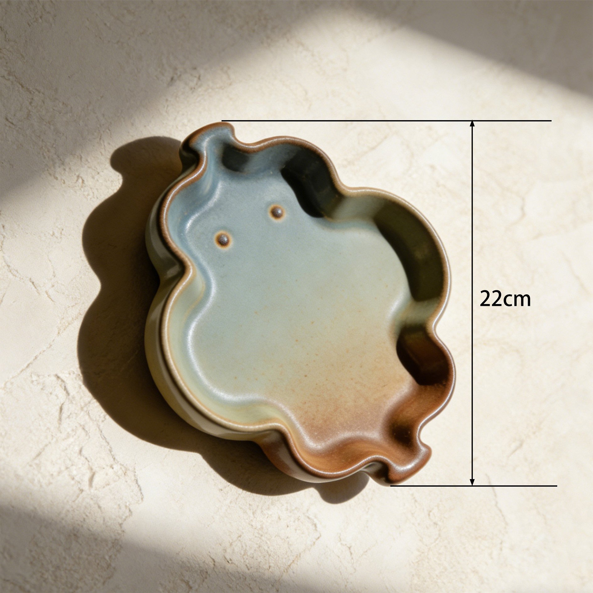 Six-piece ceramic tea set with tray and cups