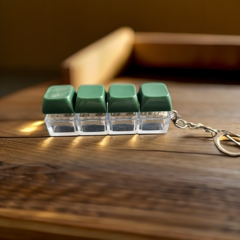 Porte-clés déstressant à boutons lumineux arc-en-ciel