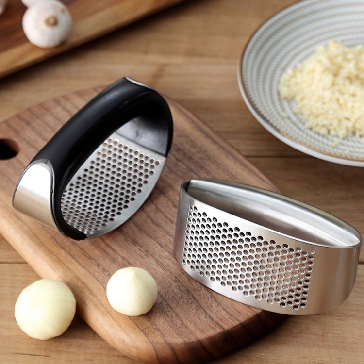 Hand-Held Garlic Press