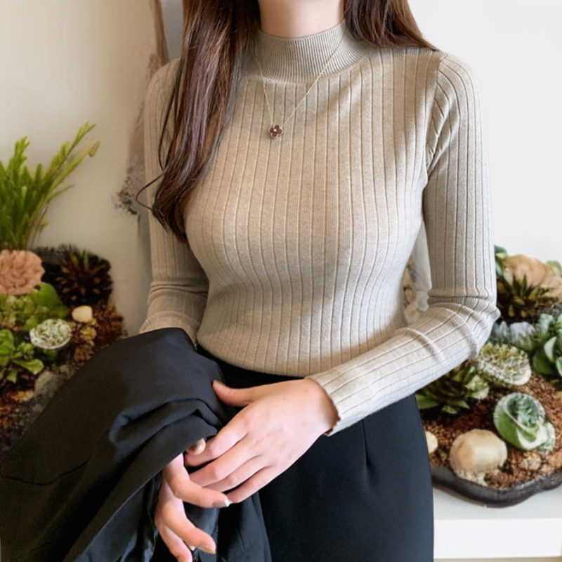 スタイリッシュなハーフハイネックセーターのディテール