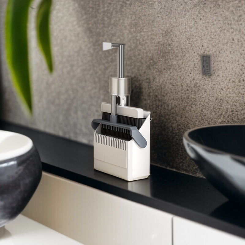 라지 빗자루로 바닥을 청소하는 모습